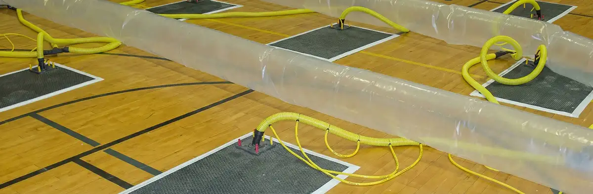water clean up drying system set up to remove moisture and prevent further damage in Des Moines, IA